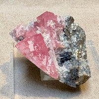 Rhodochrosite with quartz, pyrite & sphalerite (Colorado)